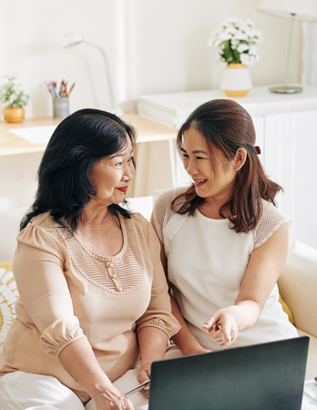 Image of Woman sitting on the beach